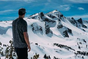 mountain-man-looking-at-snow-mountain-person-person-image.jpg